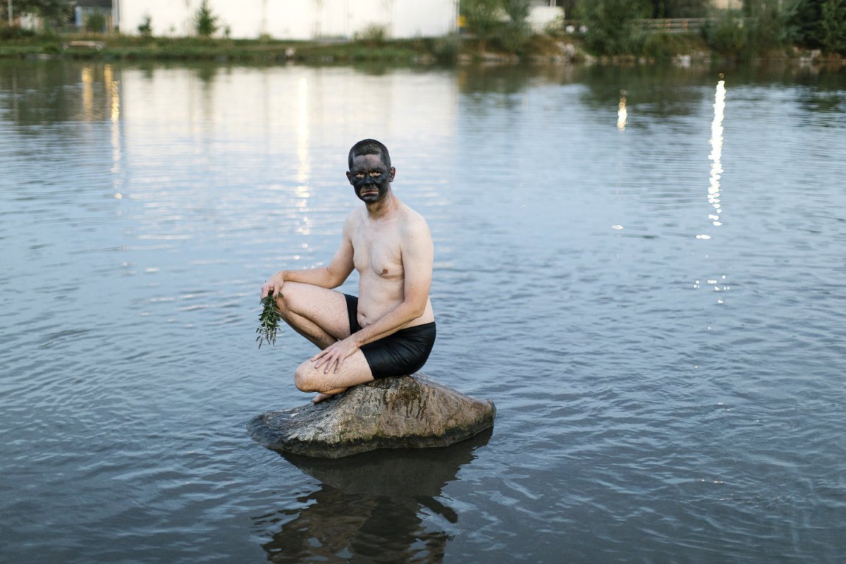 Purification, a performance in the River Mur, Second Cities, Graz, 2024, (photo: Elias Holzknecht) - artwork by Jan Karpíšek
